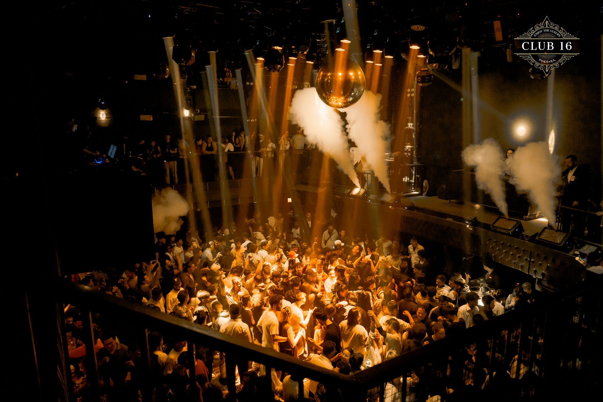 Aerial view of crowd in golden light