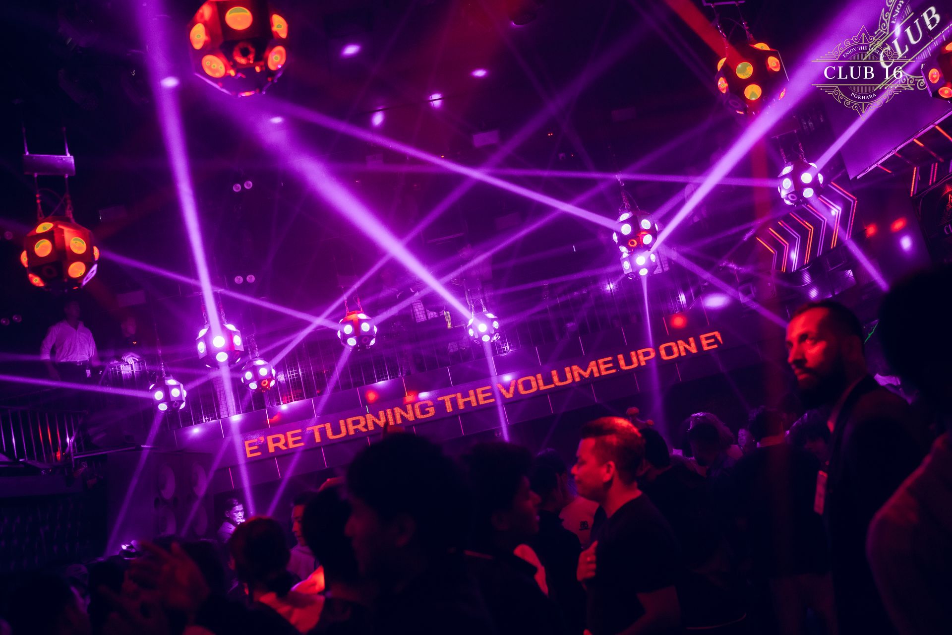 Purple lasers sweeping the crowd