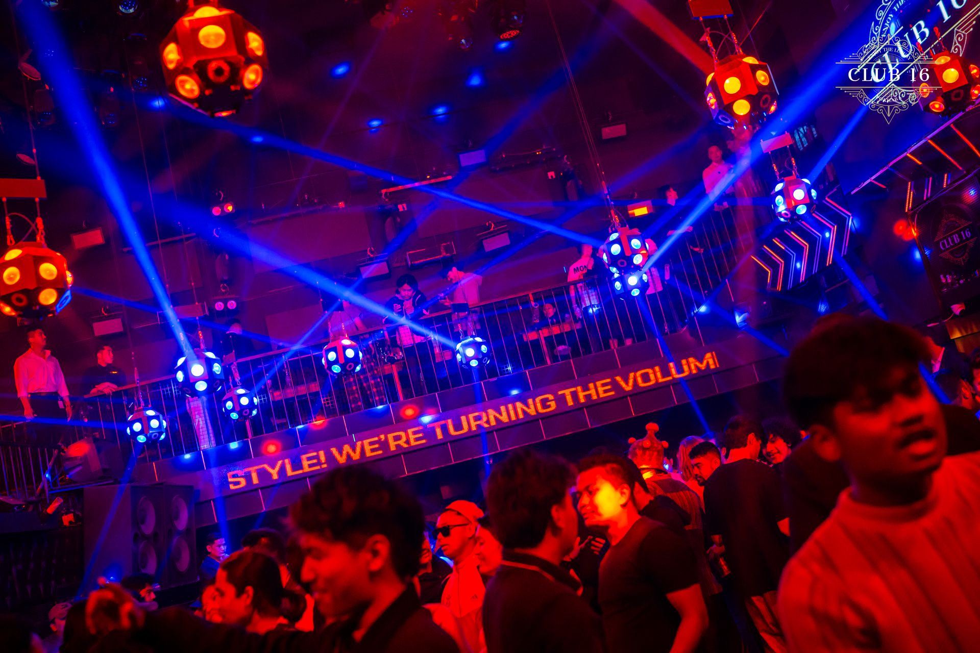 Stage performers with packed crowd