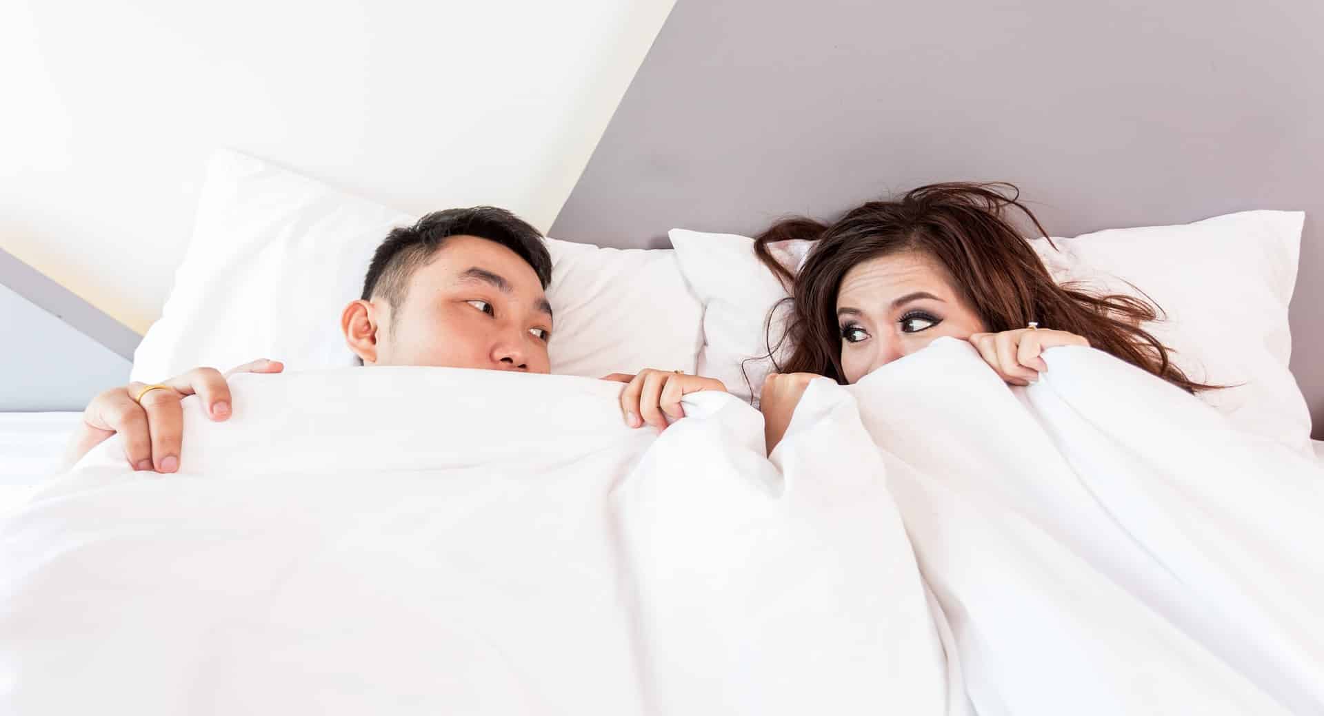 couple lying in bed