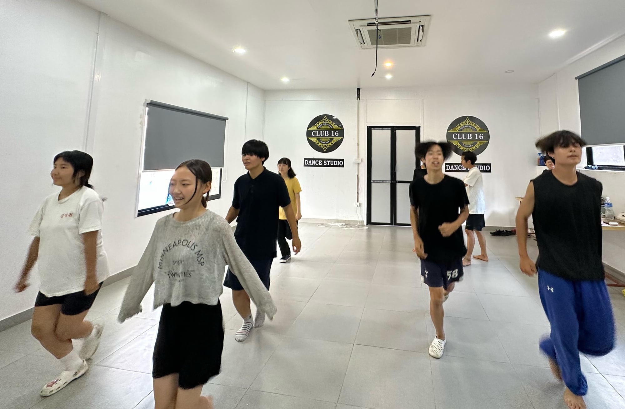 students learning dance