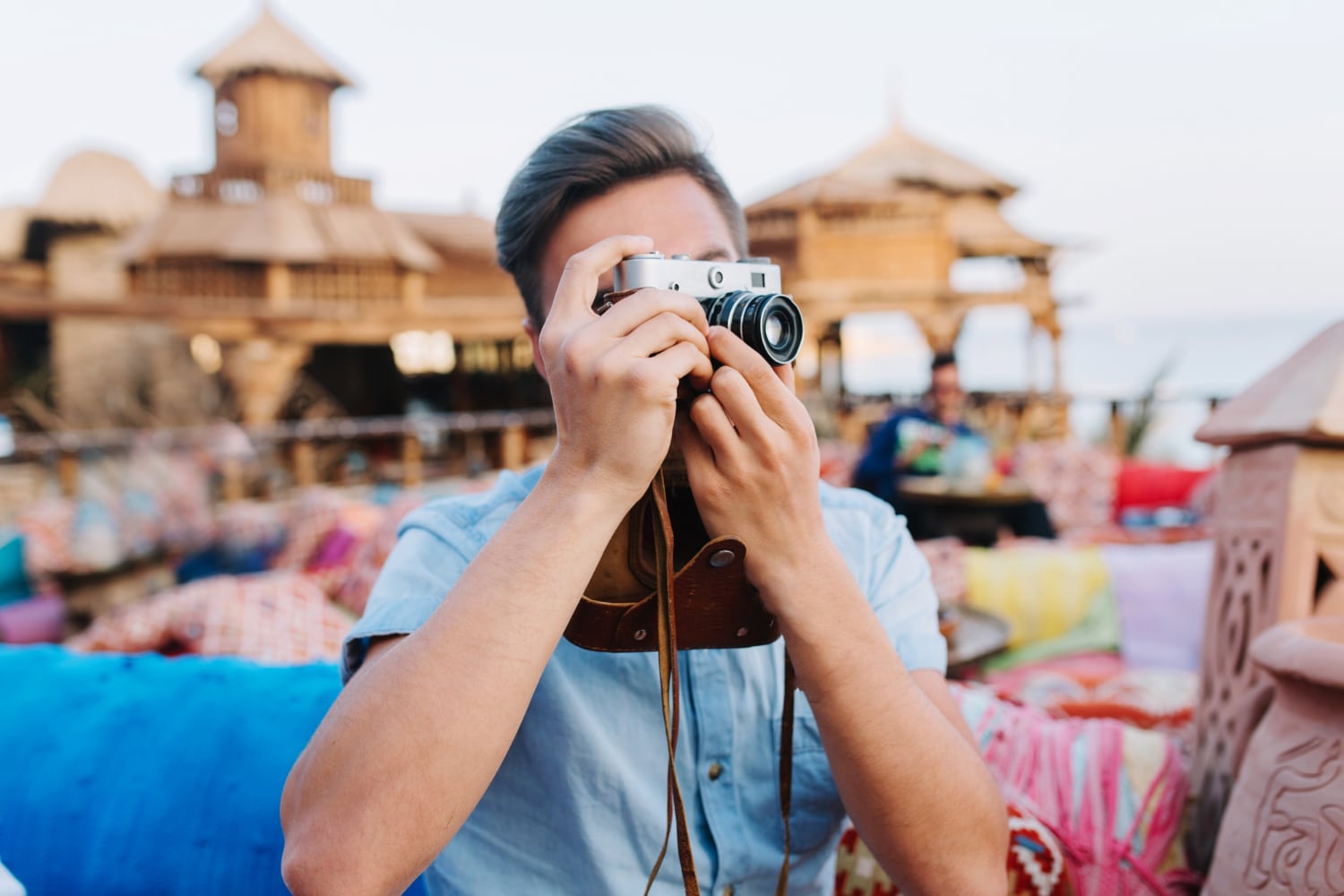 man capturing memories of pokhara nightlife